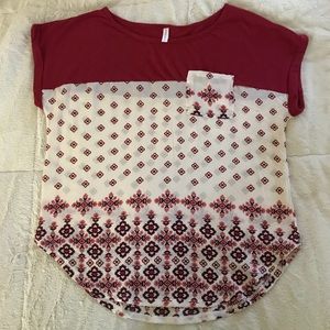 Burgundy and cream patterned top with cap sleeve